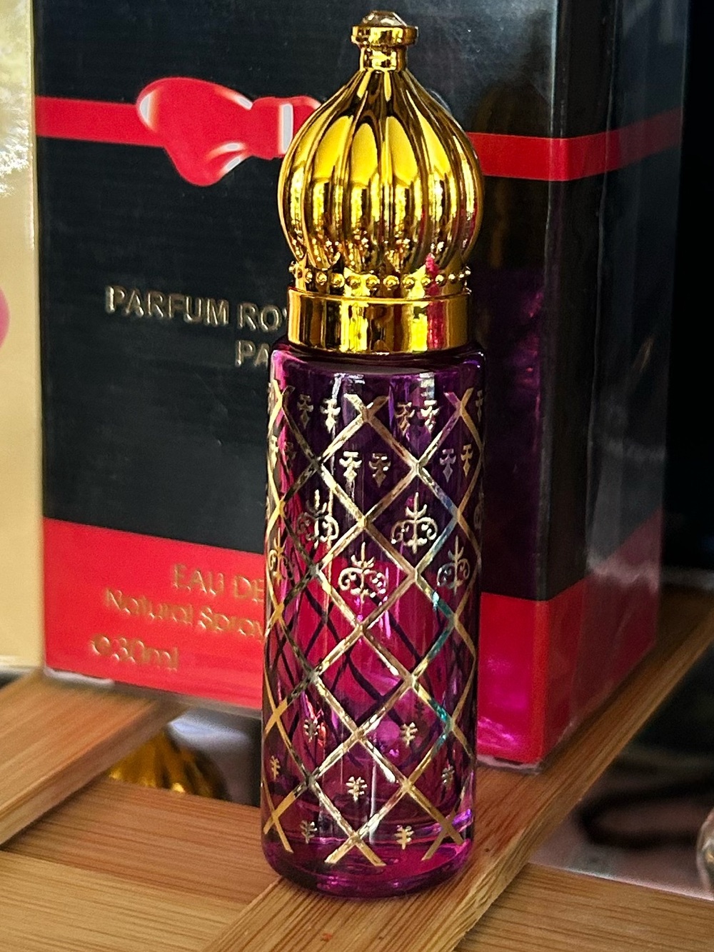 Ornate perfume container.
